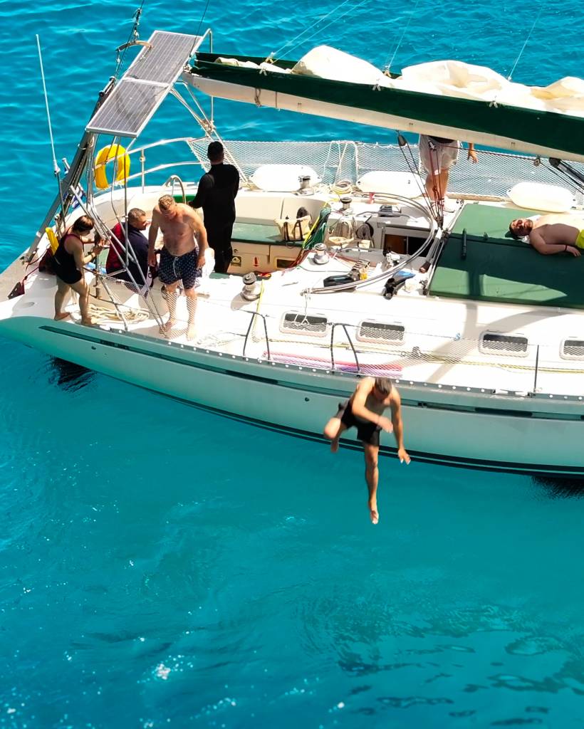 Jumping in the crystal clear water with Edisa